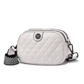 White quilted crossbody bag with daisy emblem and striped wide shoulder strap - White