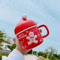 Red Christmas ceramic mug with gingerbread man pattern and Santa hat lid design - Gingerbread Man