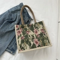 Linen tote bag with red tropical floral print and woven rope handles on denim - Style 3