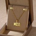 Detail shot of golden MISS script necklace and stud earrings set in a gift box - MISS Text (TZ-436)