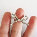 Silver bead bowknot jewelry accessory handcrafted with polished metallic round beads - Silver Fingertip Bow
