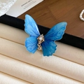 Eleganter blauer Schmetterlings-Haarclip mit Harzflügeln, Glitzersteinen und Perle-Anhänger - 40# Blau Schmetterling