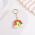 Handmade woven rainbow keychain with orange, green, and yellow cotton rope tassels - Orange Red