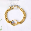 Bracciale a catena dorata con ciondolo rotondo trasparente, malocchio e cristalli a stella - Stella e Luna Rotonde