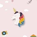 Cute white unicorn enamel pin with rainbow mane and gold horn on a pink background - Unicorn