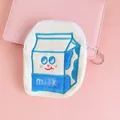 Monedero de peluche con forma de caja de leche en blanco y azul con bordado - Aprox. 14 * 12,5 cm / Leche