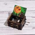 Halloween hand-cranked wooden music box with Trick or Treat artwork and metal mechanism - Hand-cranked Halloween H