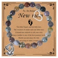 Pink zebra stone bracelet with heart and baby feet charms on a sentiment gift card - India Agate