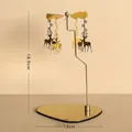 Goldener Weihnachts-Karussell-Kerzenhalter mit Rentier-Anhängern, nordische Deko - Weihnachtsrentier / Gold