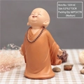 Laughing monk car decoration in bright orange robe, medium size 8.5x6.5x13cm - Open Arms (Medium Size)