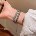 Three-color set of handmade woven beaded bracelets with adjustable drawstring closure - Blue/Handmade Woven