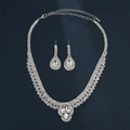 Elegant silver bridal jewelry set with sparkling teardrop crystals on a dark blue background - G0136 2-Piece Set
