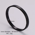 Detail of black checkerboard bangle showing 6mm width and 58x50mm inner diameter - Women's Black