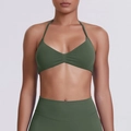 Detail of olive green halter sports bra and high-waisted leggings with matte texture - Olive Green