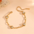 Polished 18k gold plated stainless steel heart charm bracelet with sparkling crystals - Gold Heart Bracelet (L113)