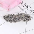 Detailed close-up of retro silver feather hair clip with crystal rhinestones on a stylish background - Feather Shape - Smoky Grey(9)