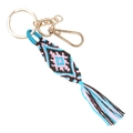 Porte-clés bohème fait main avec motif géométrique bleu et rose et glands en coton - Bleu Ciel/Rose Pâle/Marron