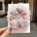 Rainbow knit scrunchie with white polka dot mesh overlay on cardboard packaging - Rainbow Colorful Scrunchie