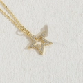 Luxury gold star pendant necklace with cubic zirconia paving and fine cable chain link - Gold Hollow Star Bangle