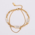Detail of double-layer gold chain bracelet with white zircon stones and S.Steel stamp - Gold