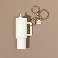 White miniature tumbler keychain with gold metal ring and white flower charm pendant - White