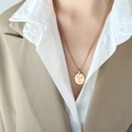 Minimalist gold necklace with abstract face pendant worn over stylish professional blazer - Rose Gold Box Chain (P952)