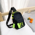Kids black nylon chest bag with neon green zipper details and alphabetic prints - Large / Black