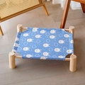 Blue canvas pet hammock with rabbit patterns and natural wooden frame structure - Blue Rabbit
