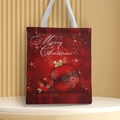 Detail of red Merry Christmas canvas tote bag with festive ornaments on white display stand - Style 49