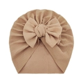 Detailed texture of khaki waffle knit baby hat featuring a large soft bow knot - Coffee