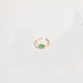Adjustable golden ring featuring a polished oval emerald green zircon gemstone - Oval Green Zirconia