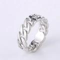 Detailed close-up of a silver-toned Cuban link chain ring with a polished metallic finish - US 7 / White