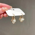 Elegant gold drop earrings featuring clusters of white cat eye stones for a chic look - Opal Three-Ball Style (1792)