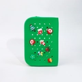 Green silicone pencil case with Christmas charms and decorative perforated holes - Large / Green