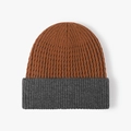 Winter two-tone beanie in brown and dark grey rib knit with a warm cuffed design - Rust red