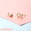 Asymmetric rabbit and carrot stud earrings with sparkling crystals in gold finish - Fish and Rabbit