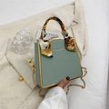 Elegant mint green leather box bag with silk scarf handle and golden chain strap - Light Green