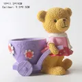Vaso per piante succulente in resina orsetto giallo con carriola viola 19x11.5x19cm - Orso che tira il Carretto Viola