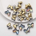 Close-up of 10x14mm butterfly glass beads with metallic and iridescent gradient finishes - Half Gold Inner Multicolor