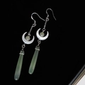 Elegant silver tassel earrings with white crescent and light green teardrop pendants - Moonrise Over Sea Drop Earrings