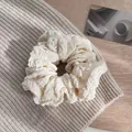 Elegant cream-white oversized scrunchie with pleated texture on soft grey background - Beige White Large