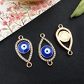 Blaue böse Blick-Verbinder in Goldoptik mit Strasssteinen für Schmuckherstellung - KC Gold Böser Blick 13x25mm