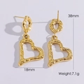 Orecchini a cuore dorati con trama martellata e dimensioni misurate 38x18mm - Oro