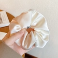 Elegant white satin scrunchie with smooth glossy texture for women's hair styling - Milk Yellow