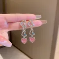 Detailed view of layered silver heart earrings with a glittery pink heart pendant - Silver Heart Shape with Pink Heart Pendant Style with 925 Sterling Silver Earring Post (22#)