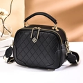 Black quilted crossbody bag with golden clover buckle and striped wide strap - Black Grid Pattern