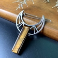 Detailed close-up of a crescent moon hair clip featuring a natural tiger eye stone inlay - Tiger Eye Hollow Hair Clip