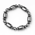 Poliertes Hämatit und Terahertz Energiestein Armband mit dunklen Metallperlen - Runde Distanzperlen