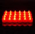 Set of 24 red LED flameless tea lights with warm yellow flicker for Christmas decor - Red LED Tea Lights 24Pcs Set