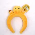 Yellow plush headband featuring the cute Nailong dragon character with tags - Little Dinosaur Vitality Headband - Arrogant (DA1201)